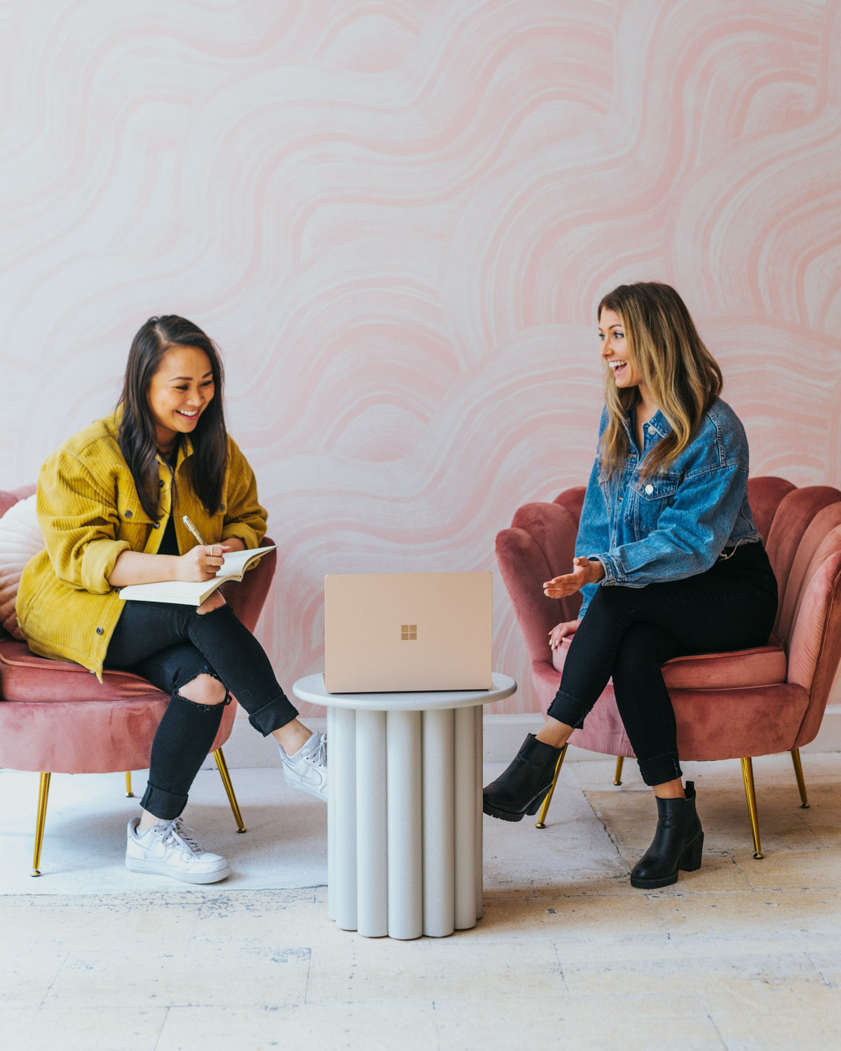 Two women in a consultation across a small table