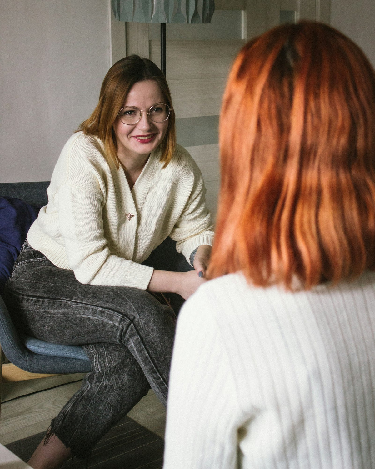 Two women in a calm one-on-one conversation