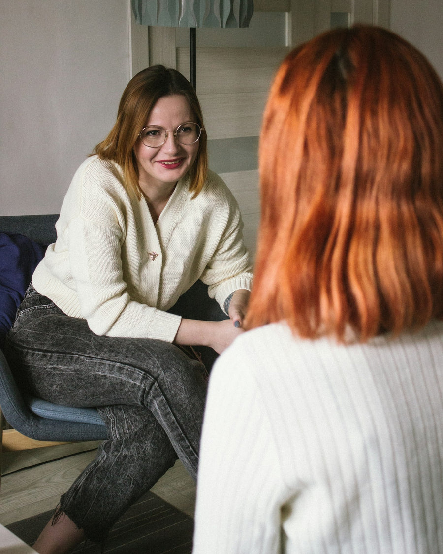 Two women in a calm one-on-one conversation